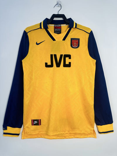 Camiseta Retro Arsenal 1991-1993 amarilla y azul con logo JVC y Nike, manga larga.