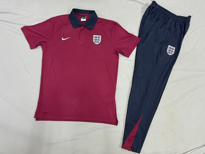 Short sleeve polo shirt with badge and long trousers set.